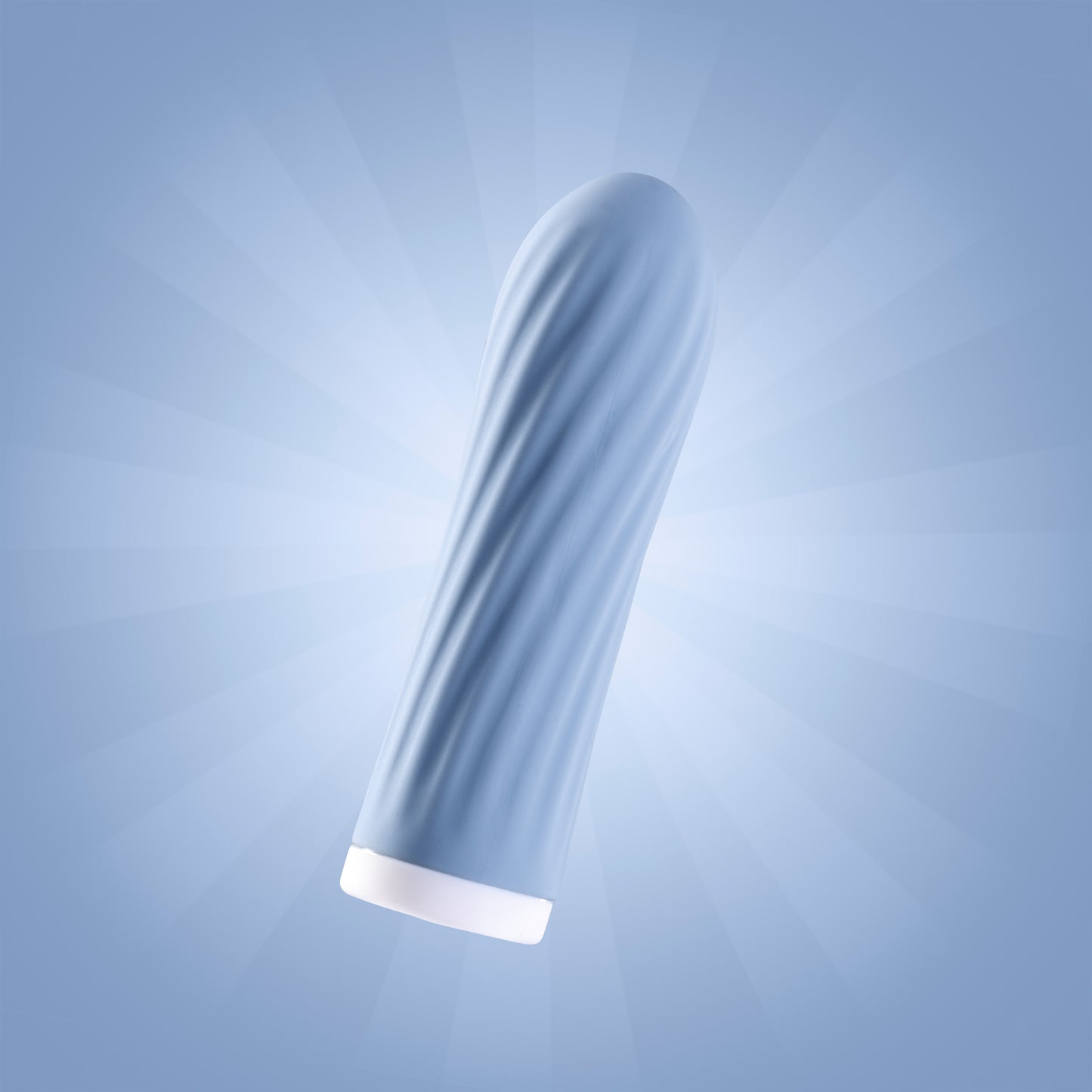 Blue bullet vibrator suspended in air against blue background