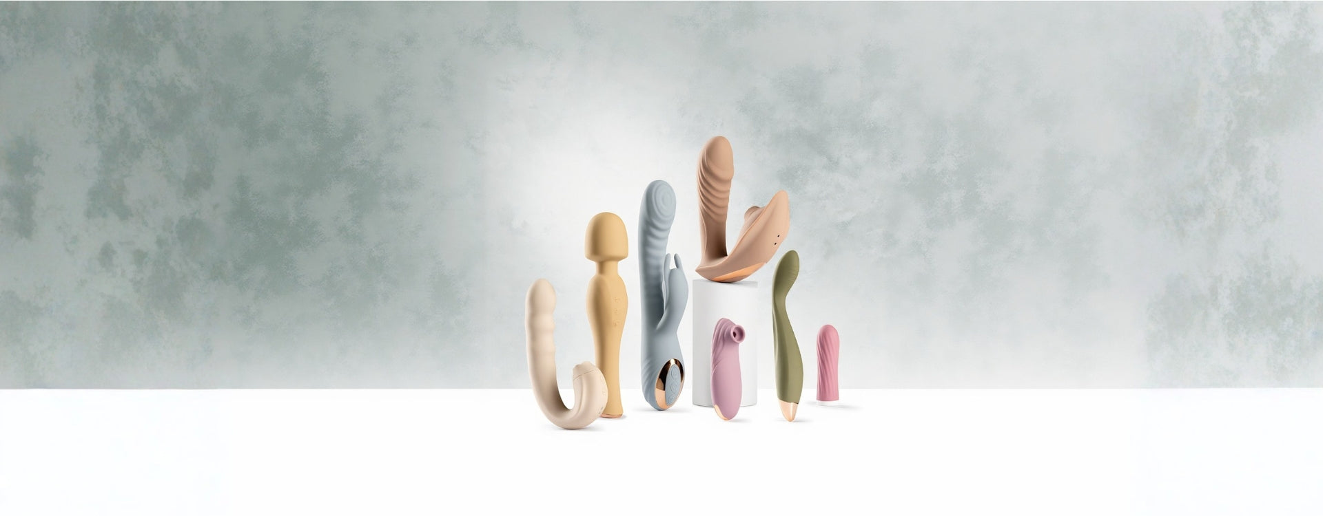 Full SmootherVibes vibrator collection displayed together — wand, rabbit, suction, licking, G-spot, and bullet vibrators.