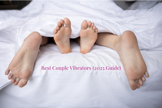 Two partners' feet under a white duvet, representing intimacy for the Best Couple Vibrators UK 2025 Guide.