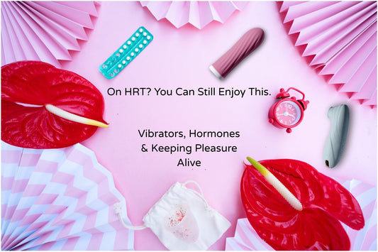 Flat lay of HRT pill pack, vibrators, and clock on pink background with text: On HRT? You Can Still Enjoy This. Vibrators, Hormones & Keeping Pleasure Alive